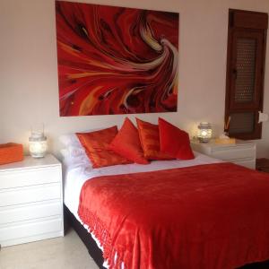 A bed or beds in a room at La Torre Alba - La Finca Golf Resort
