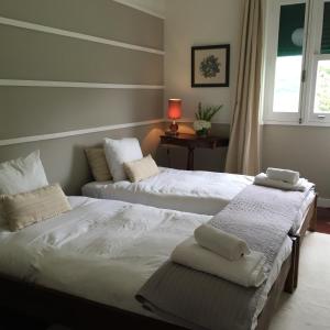 Cama ou camas em um quarto em Casa Do Populo