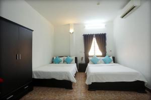 Postel nebo postele na pokoji v ubytování DaNa Home Hotel - Apartment