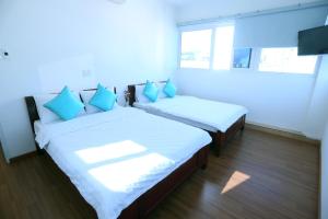Postel nebo postele na pokoji v ubytování DaNa Home Hotel - Apartment
