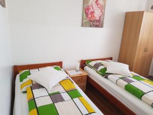 Postel nebo postele na pokoji v ubytování Pension Lindengarten