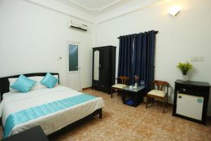 Postel nebo postele na pokoji v ubytování DaNa Home Hotel - Apartment