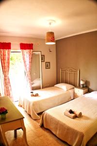 Säng eller sängar i ett rum på Corfu Villa Galini