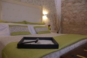 Postel nebo postele na pokoji v ubytování Artemisia Resort