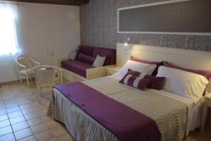 Postel nebo postele na pokoji v ubytování Artemisia Resort