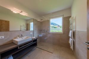 Koupelna v ubytování Hotel Garni Herz
