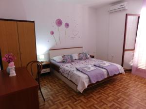 Postel nebo postele na pokoji v ubytování Guest house Ivanka