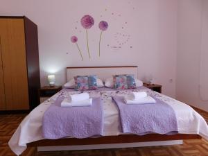 Postel nebo postele na pokoji v ubytování Guest house Ivanka
