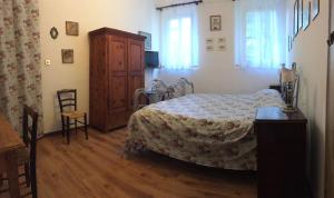 Postel nebo postele na pokoji v ubytování Alloggio Agrituristico DODICI-APOSTOLI