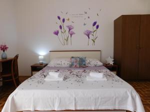 Postel nebo postele na pokoji v ubytování Guest house Ivanka