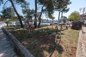 Vonkajšia záhrada v ubytovaní Apartmani Ivanov Poljana