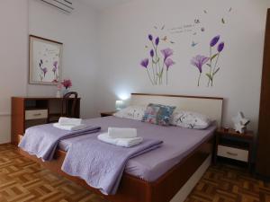 Postel nebo postele na pokoji v ubytování Guest house Ivanka