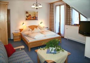 Katil atau katil-katil dalam bilik di Ferienhotel Barmsee