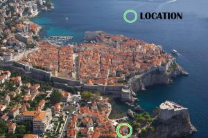 an aerial view of a town on the water at Old Harbour City Center Apartment in Dubrovnik