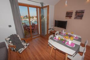 Posedenie v ubytovaní Apartmani Ivanov Poljana