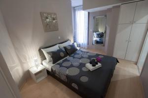 Posteľ alebo postele v izbe v ubytovaní Apartmani Ivanov Poljana