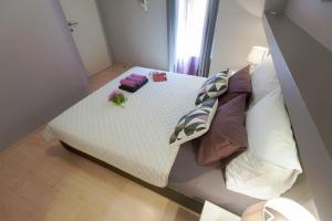 Posteľ alebo postele v izbe v ubytovaní Apartmani Ivanov Poljana