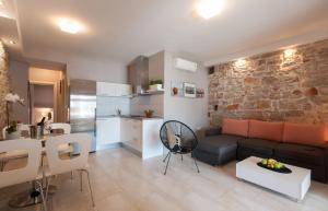 Kuchyňa alebo kuchynka v ubytovaní Apartmani Ivanov Poljana
