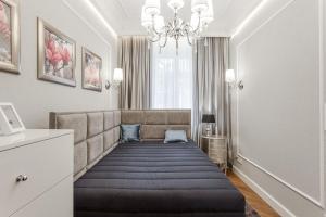 Łóżko lub łóżka w pokoju w obiekcie Luxury Apartments - Wroclaw Old Town - Wrocław Rynek