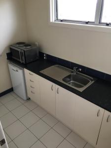 Kuchyň nebo kuchyňský kout v ubytování Mount View Motel Hawera