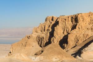 a mountain in the middle of the desert at Kfar Hanokdim - Glamping & Camping in Arad +38 photos