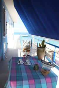 Ένα ή περισσότερα κρεβάτια σε δωμάτιο στο Appartamento Il Gabbiano