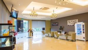 TV a/nebo společenská místnost v ubytování Castello Hotel