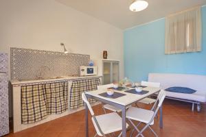 Eldhús eða eldhúskrókur á Residence Favignana