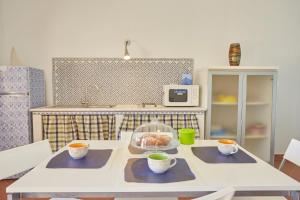 Kuchyň nebo kuchyňský kout v ubytování Residence Favignana