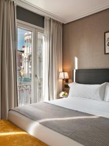 The Principal Madrid, Small Luxury Hotels 객실 침대