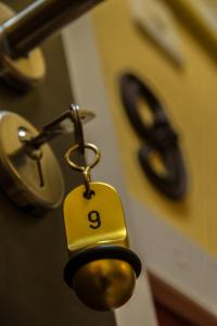 a padlock on a door with a number eight on it at Pension Menge in Bad Schandau