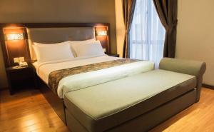 Postel nebo postele na pokoji v ubytování Castello Hotel