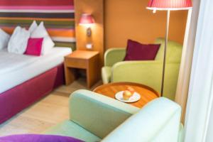 Postel nebo postele na pokoji v ubytování Hotel Therme Meran - Terme Merano