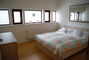 Postel nebo postele na pokoji v ubytování Horský Chalet Harrachov