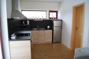 Kuchyň nebo kuchyňský kout v ubytování Horský Chalet Harrachov