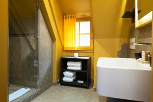 Koupelna v ubytování Hotel Le Colombier Suites