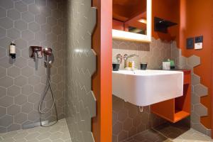 Koupelna v ubytování Hotel Le Colombier Suites