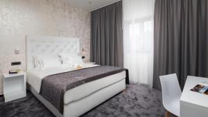 Posteľ alebo postele v izbe v ubytovaní Marina Baotić Apartments