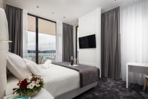 Posteľ alebo postele v izbe v ubytovaní Marina Baotić Apartments