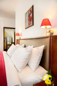 Postel nebo postele na pokoji v ubytování Greguar Hotel by UHM