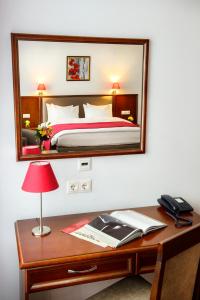 Postel nebo postele na pokoji v ubytování Greguar Hotel by UHM