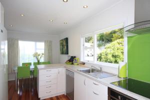 a kitchen with a sink and a window at Durie Vale Retreat in Whanganui