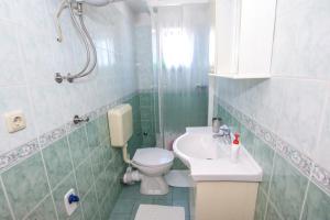 Et badeværelse på Apartmani Ljubica + 10 billeder