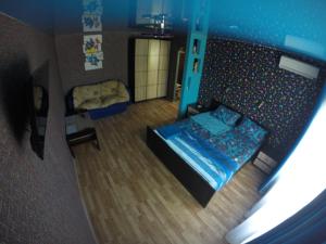 a small bedroom with a bed in a room at Apartmens on Khabarovskaya in Kryvyi Rih