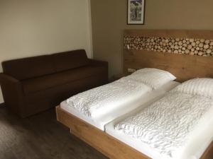 Postel nebo postele na pokoji v ubytování Pension Appartments Christoph