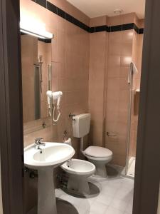 Koupelna v ubytování NovaHotel
