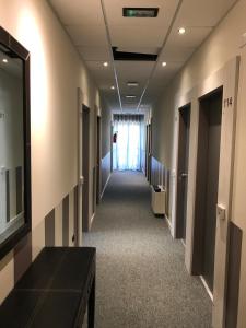 TV a/nebo společenská místnost v ubytování NovaHotel