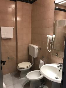Koupelna v ubytování NovaHotel
