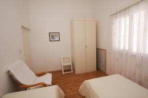 Posteľ alebo postele v izbe v ubytovaní Apartments Jolanda