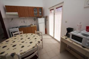 Kuchyňa alebo kuchynka v ubytovaní Apartments Jolanda